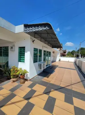 a white building with a tile floor and a roof at Ipoh Cozy Premium Spacious Home in Ipoh