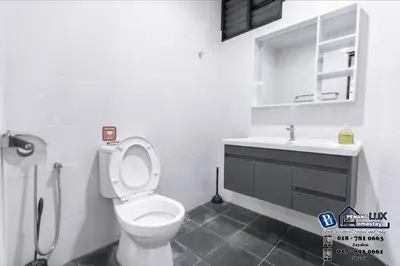 a white bathroom with a toilet and a sink at 20BR SwimmingPool Villa Golf View Snooker BBQ in Bayan Lepas