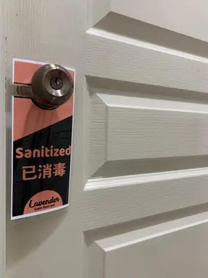 a sign on a door with a sign on it at Lavender house IPOH in Ipoh