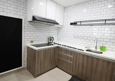 a kitchen with a sink and a counter top at H2H - Cherry house Majestic in Ipoh