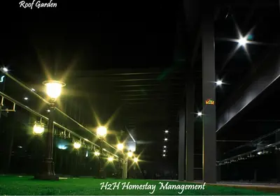 a row of street lights at night at H2H - Cherry house Majestic in Ipoh