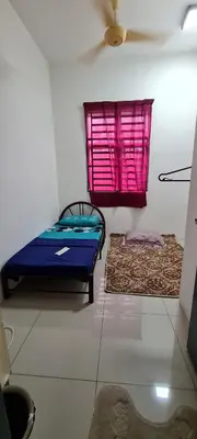 a room with two beds and a pink window at D'HutHomestay Puncak Iskandar in Seri Iskandar