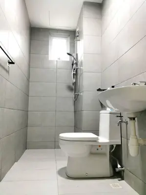 a bathroom with a toilet and a sink at Paradise Home- 10Pax/4CarPark- Pg Bridge/KPJ Hosp in Bukit Mertajam