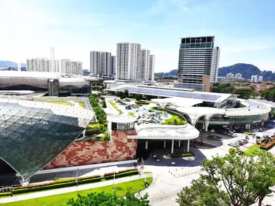 a view of a building in a city at TuR10-Oppesite Pisa Stadium-1min-FoodCourt-MiniMarket in Bayan Lepas