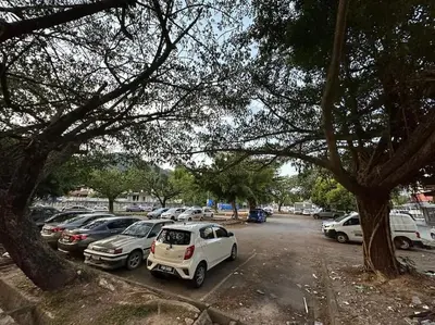 a bunch of cars parked in a parking lot at CEO9 Duplex Premier 6 Pax Suite#Disneys HS #PISA #USM #Pantai Hospital in Bayan Lepas