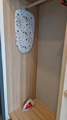 a computer mouse sitting on a shelf under a mirror at H&W Sunway Onsen Suites Services Tambun Ipoh S-15-12 in Ipoh