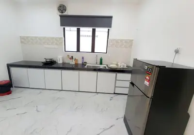 a kitchen with a sink and a refrigerator at (New)Jovial Cozy&Stylish House 4Room@BM Sri Rambai in Bukit Mertajam
