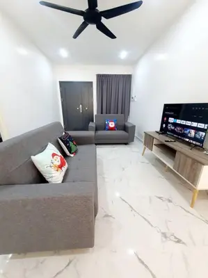 a living room with a couch and a ceiling fan at (New)Jovial Cozy&Stylish House 4Room@BM Sri Rambai in Bukit Mertajam