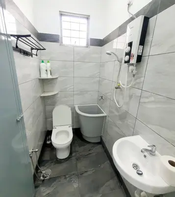 a bathroom with a toilet and a sink at (New)Jovial Cozy&Stylish House 4Room@BM Sri Rambai in Bukit Mertajam