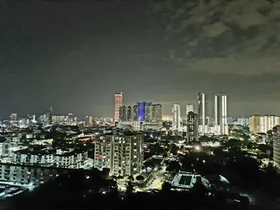 a city skyline at night with tall buildings at Beacon Executive Suite - Skypool Penang View in George Town