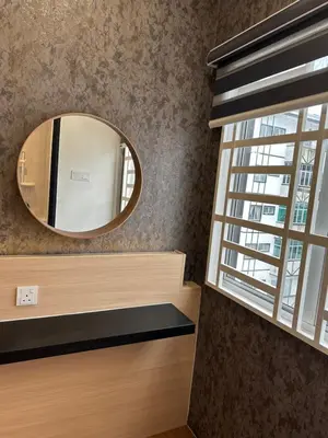 a bathroom with a mirror and a window at Adik Aisyah Black forest Cameron Highlands homestay For Muslim in Cameron Highlands