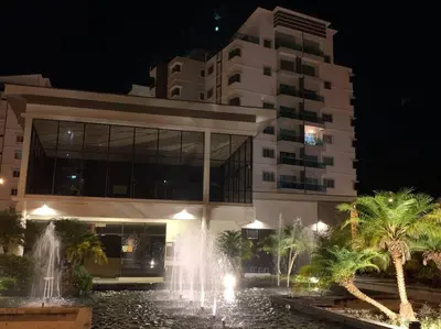 a building with a fountain in front of a building at Sunrise Terrace at Quintet (3BR/8 pax) in Tanah Rata