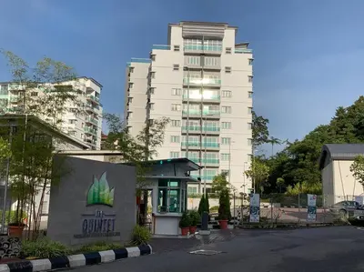 a large white building in front of a building at Sunrise Terrace at Quintet (3BR/8 pax) in Tanah Rata