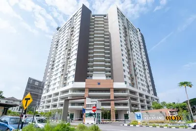 a large tall building with a parking lot in front of it at Ipoh Town P Kepayang in Ipoh