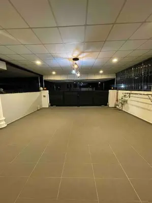 a large room with a large tile floor in a building at Cozy Stay At Raintown Taiping in Kamunting