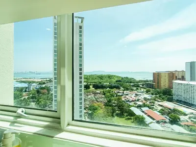 a window with a view of a city at Deluxe Suites 2, Netflix ,2-5 pax, Georgetown in George Town