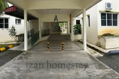 a hallway of a building with a sign on it at Anoi Homestay TAMBUN @ Lost World HighSpeed WiFi in Tambun