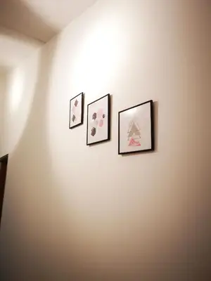 four pictures on a wall in a room at Minimaliste Ipoh Garden 2 minute to stadium 5BR5BR in Ipoh