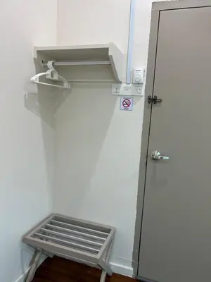 a room with a door and a bench next to it at myRoom Georgetown, Off Jalan Burma, Gurney Drive in George Town