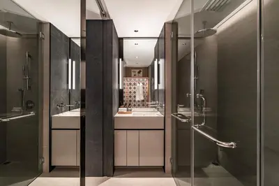 a bathroom with two sinks and a shower at Crowne Plaza Penang Straits City by IHG in Perai