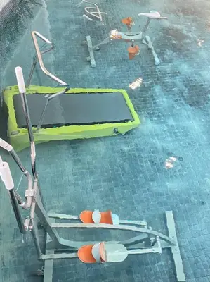 an overhead view of a pool with chairs and tables at Urban Suites Georgetown, Penang in Jelutong