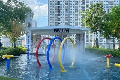 a water park with a fountain in the water at Urban Suites Georgetown, Penang in Jelutong
