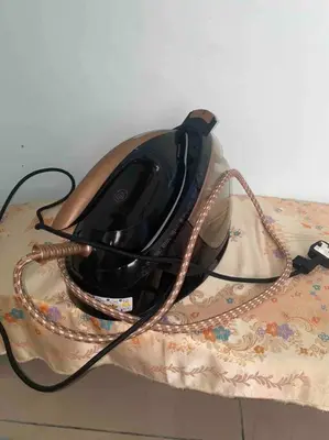 a telephone sitting on top of a table at Homestay Naim Sabak Bernam in Sabak Bernam