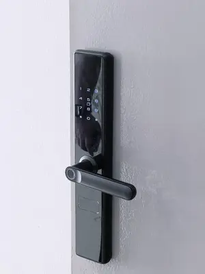 a black door handle on a white wall at Manhanttan Ipoh Waterpark Homestay By Warmth Stay 4-7pax 3BR in Ipoh
