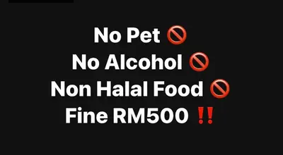 a sign with the words no pet no alcohol no alcohol non halal food fire at D' Tronoh Home in Teronoh