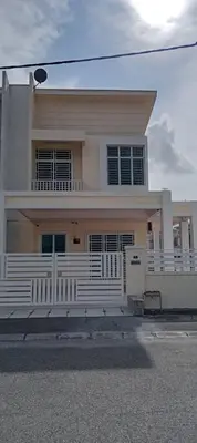 a white house with a white fence in front of it at D' Tronoh Home in Teronoh