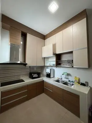a kitchen with white cabinets and a sink and a stove at LOW SEASON PROMOTION! 4B12B Bar 5 min City Center in Ipoh