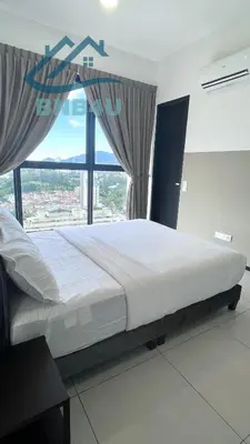 a large bed in a room with a large window at Urban Suites Georgetown by BNB4U in Jelutong