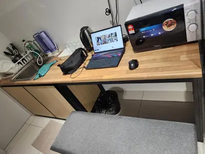 a desk with a laptop computer and a printer at Horizon Premium Suite - Ipoh in Ipoh