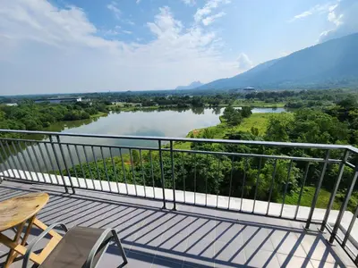 a balcony with a view of a river at Balcony Forest Lake Mountain in Kampar