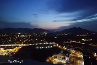 a view of a city at night with lights at Time Homestay (6-8pax) The Venus, Manjung/Sitiawan in Sitiawan