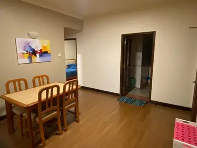 a dining room with a table and chairs in a room at COZY HOME COPTHONE RESORT in Brinchang