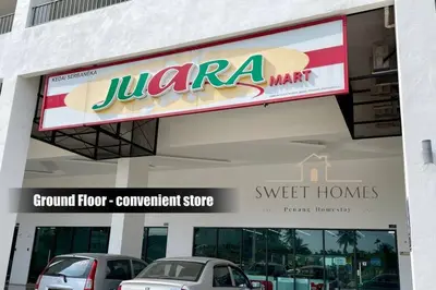 a sign for a grocery store with cars parked outside at Catty Suite Prai • 3BR • 2Carparks@6mins PG Bridge in Perai