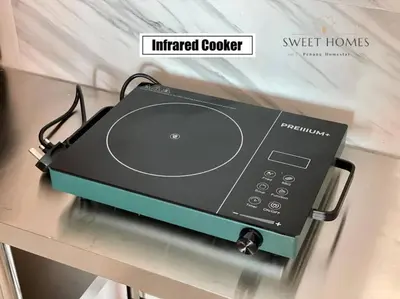 a toaster oven sitting on top of a table at Catty Suite Prai • 3BR • 2Carparks@6mins PG Bridge in Perai
