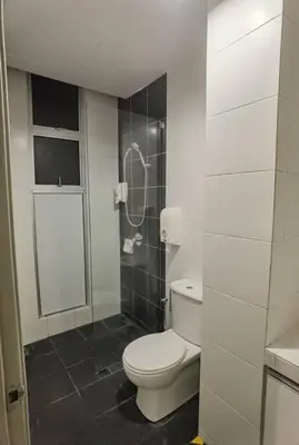 a bathroom with a toilet and a shower at G Residence - 2R2B Barrington Night Market (1) in Brinchang