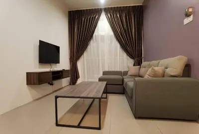 a living room with a couch and a coffee table at G Residence - 2R2B Barrington Night Market (1) in Brinchang
