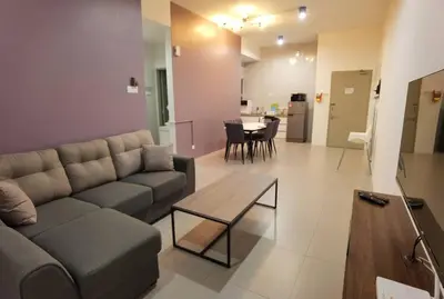 a living room with a couch and a table at G Residence - 2R2B Barrington Night Market (1) in Brinchang