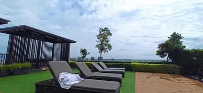 a group of chairs sitting on top of a lawn at Beacon Executive Suites George Town Apartment Malaysia deals in George Town