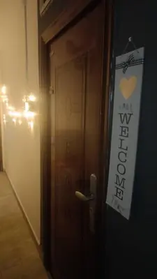 a door with a sign on it with a love sign on it at Mini Studio in Permatang Pauh