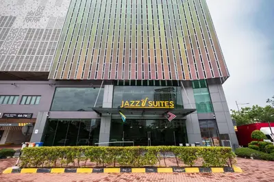 a building with a sign that reads katz suites at The Jazz Serviced Suites in Tanjong Tokong