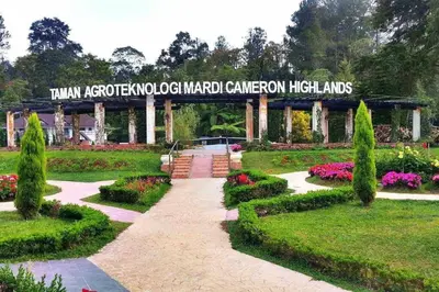 a garden with a sign that reads virgin accelerated garden cameron highlands at Hanna Homestay Apartment for Muslim in Tanah Rata
