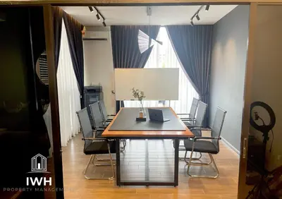 a conference room with a table and chairs at Ipoh 19A Villa for 12pax 6 Carpark with BBQ by IWH in Ipoh
