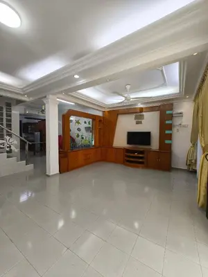 a large living room with a tv at Pangkor Island Seaside @ 4 rooms Homestay in Pasir Bogak