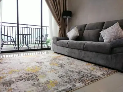 a living room with a couch and a rug at be.Bliss-8mins Lost World Tambun-6-7pax in Ipoh