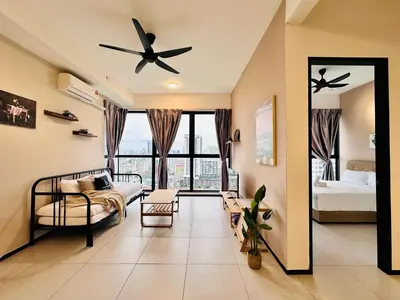 a living room with a couch and a ceiling fan at New 2BR or 3BR Cozy Urban Suite Homestay at Georgetown8-10pax by URBAN STAYCATIONS LOD COSY in Jelutong
