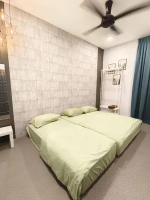 a bedroom with a large bed with a ceiling fan at Ocean Private Pool Homestay Ipoh \u6d77\u6d0b\u98ce\u60c5\u6cf3\u6c60\u6c11\u5bbf 14px\uff08Wellsonhome\uff09 in Ipoh